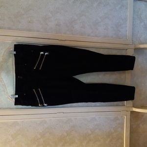 TORRID new without tags stretch denim black jeans with gold zippers.
